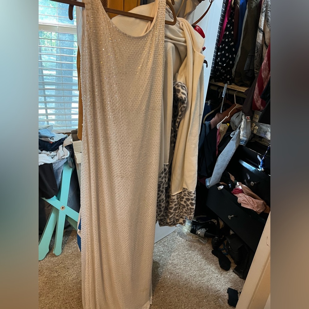Evening gown. White with beaded design.